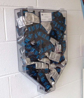 Condom dispensers are going into 22 city high schools. The protection is free to students, except those whose parents signed opt-out forms.
